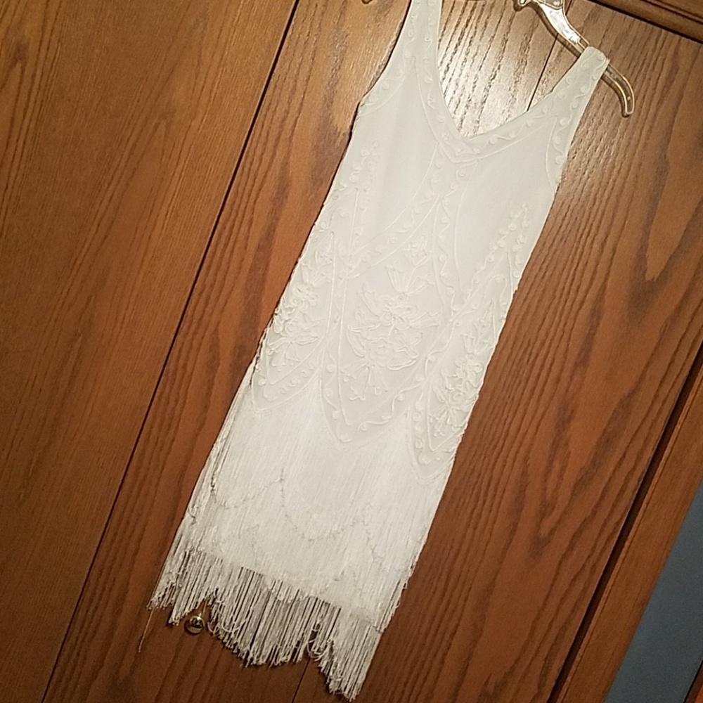 Elegant white flapper dress.
